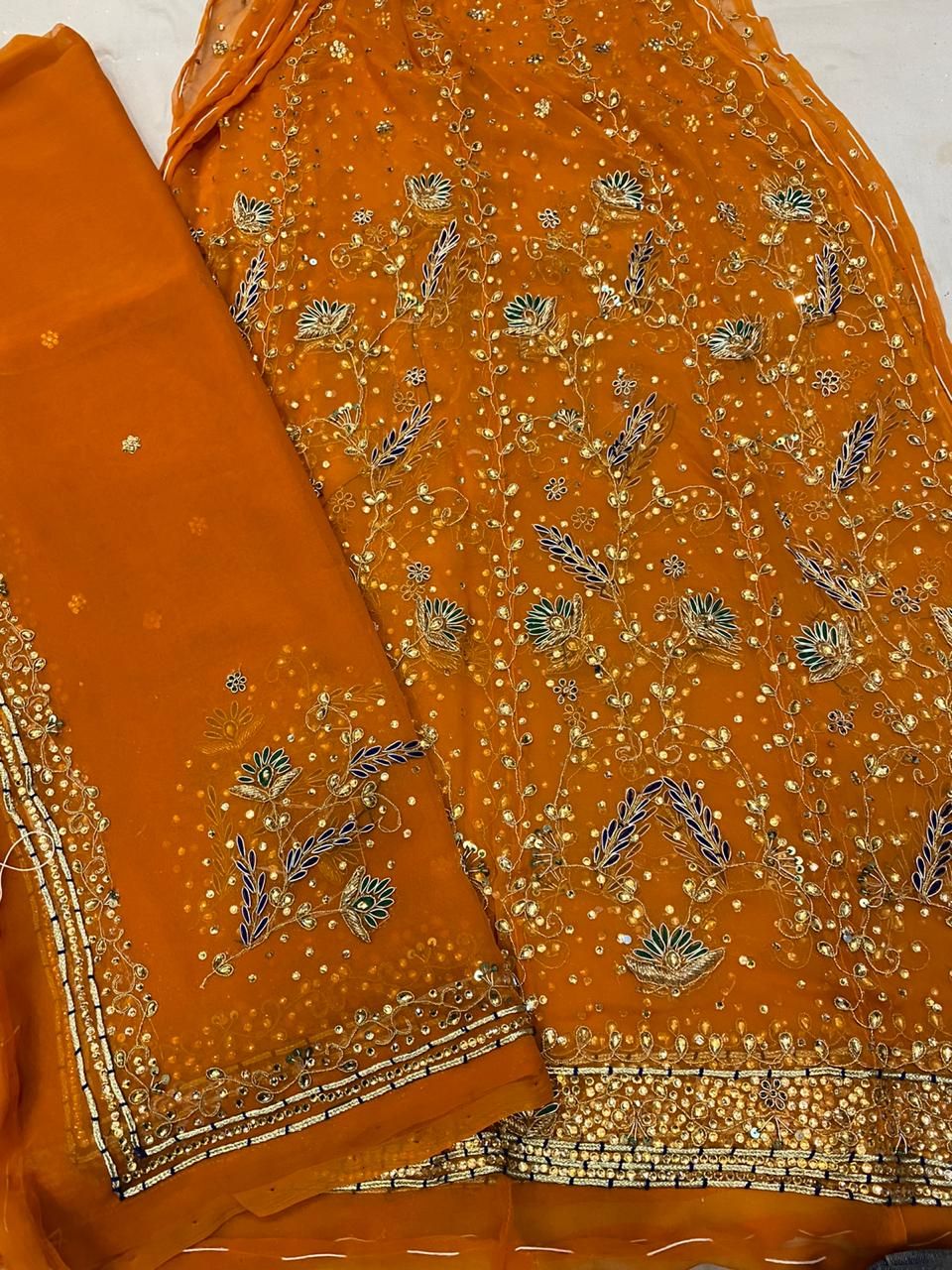 Rajasthani Poshak in Dust colour with Full work.