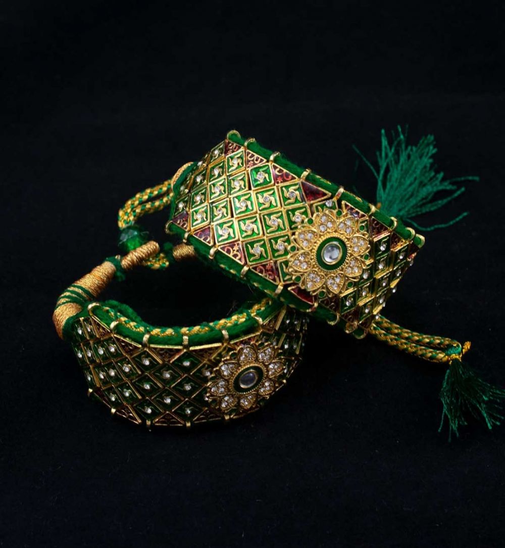 Green Puncha with Round Pendant at the Center