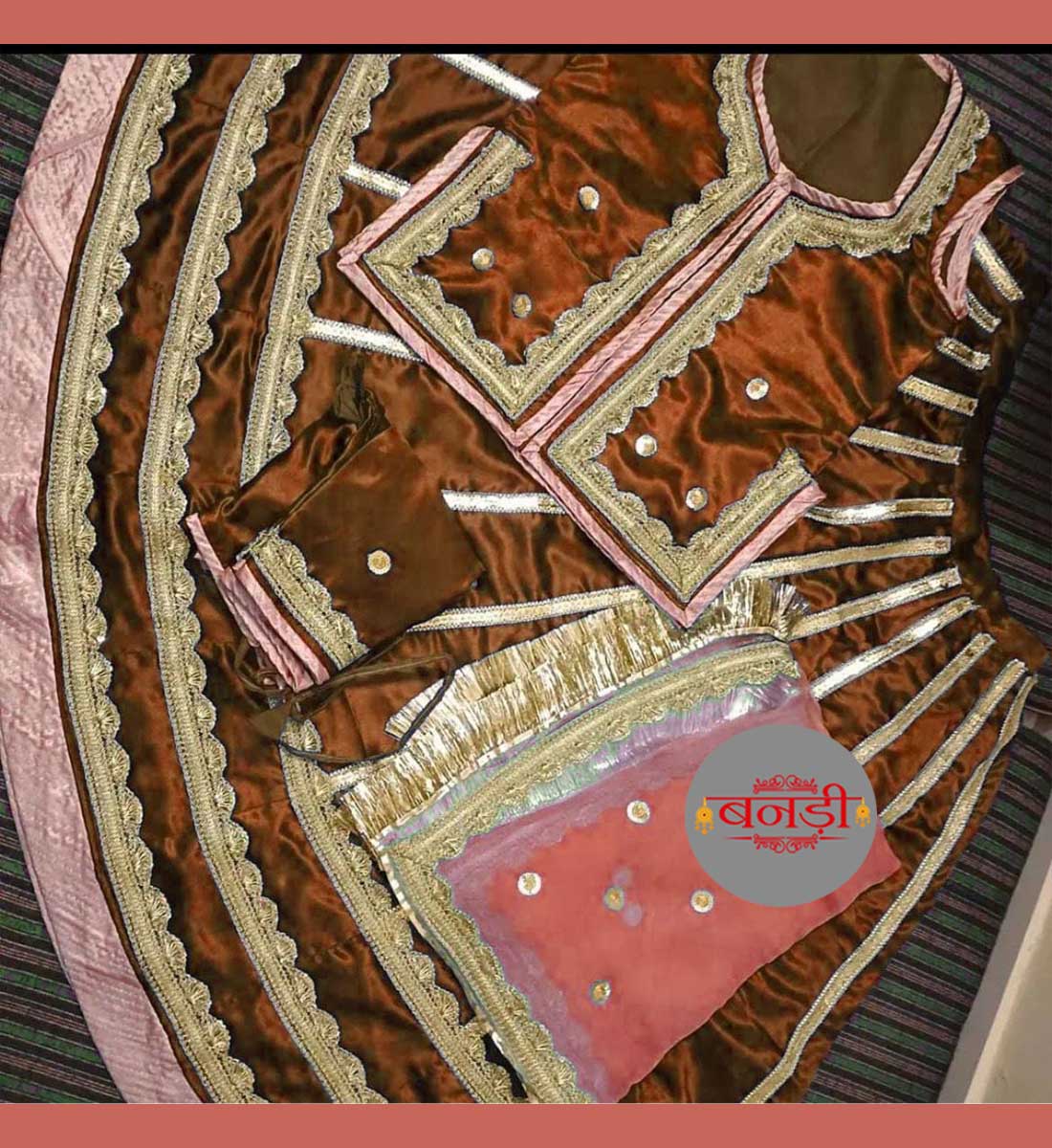 Rust Color Lace Work Poshak with Light Gajri Odhani and Magji
