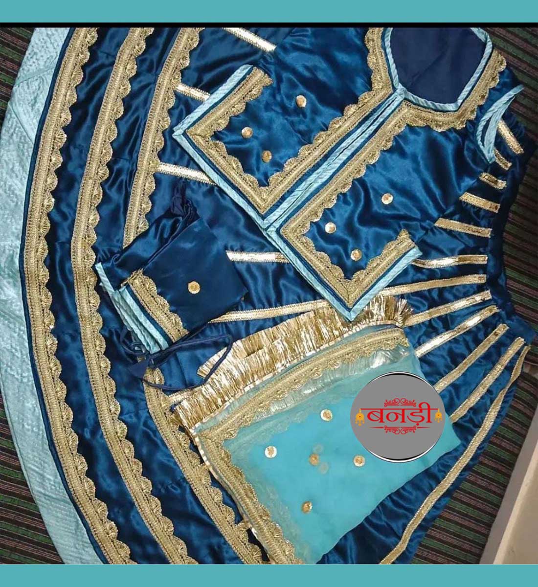Dark Blue Lace Work Poshak with Light Blue Odhani and Magji