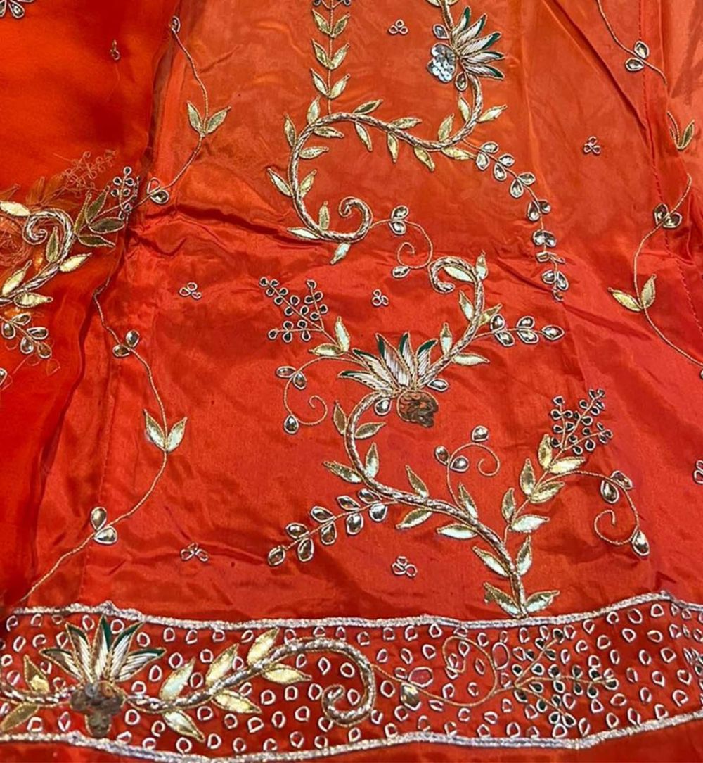 Dark Orange Poshak with Heavy Jardoji Work at Beendani