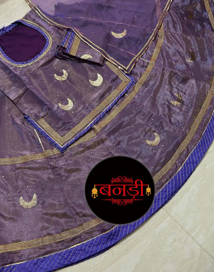 tissue poshak in purple shade with contrast blue magji