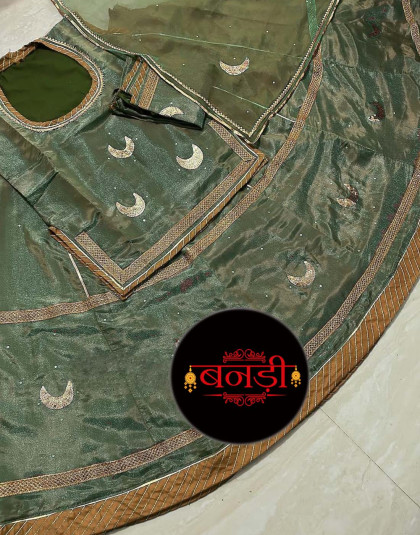 tissue poshak in mehandi shade with contrast blue magji