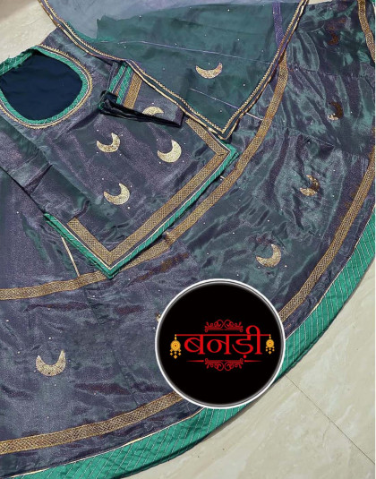 tissue poshak in grey shade with contrast green magji